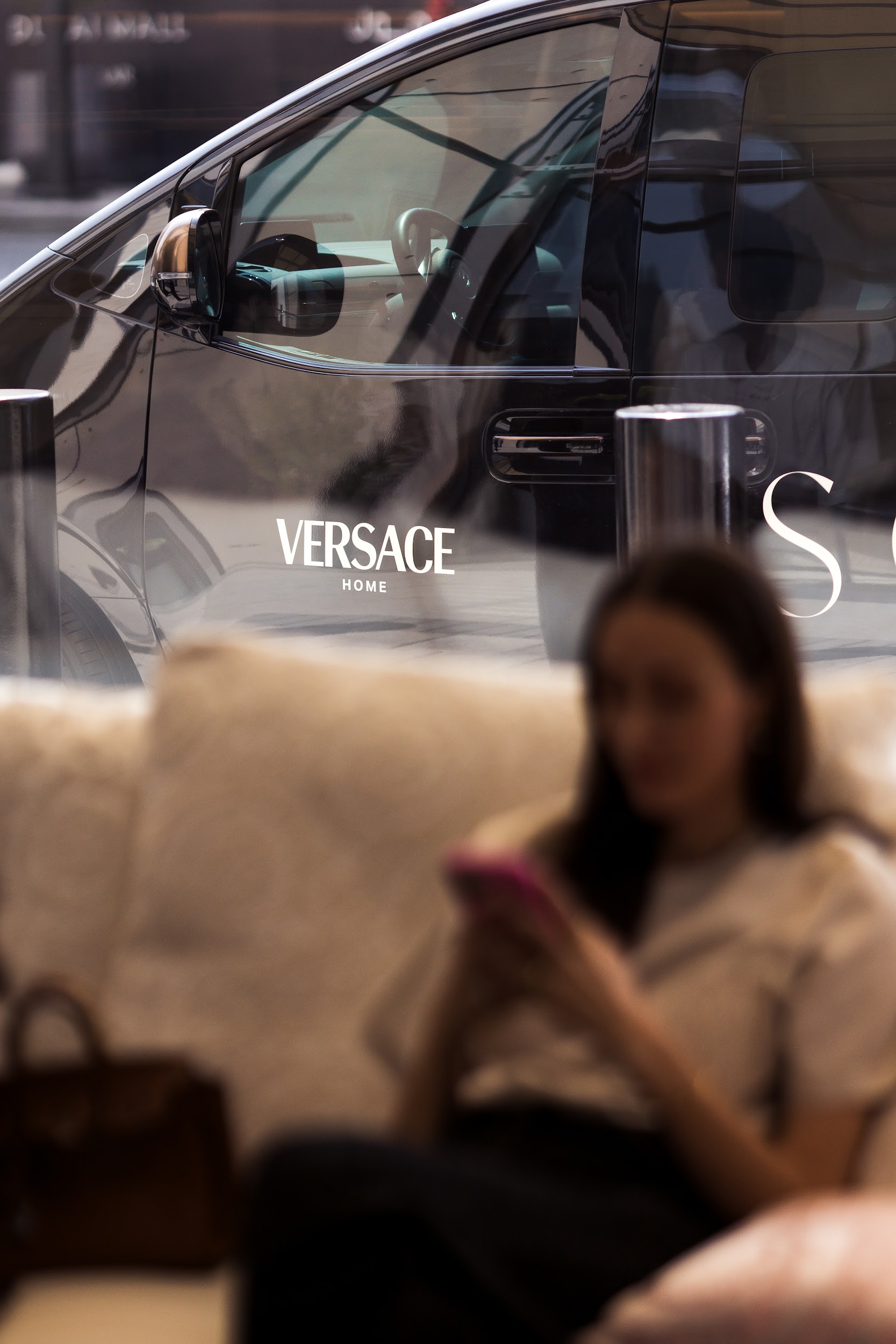 A Versace Home car outside the showroom