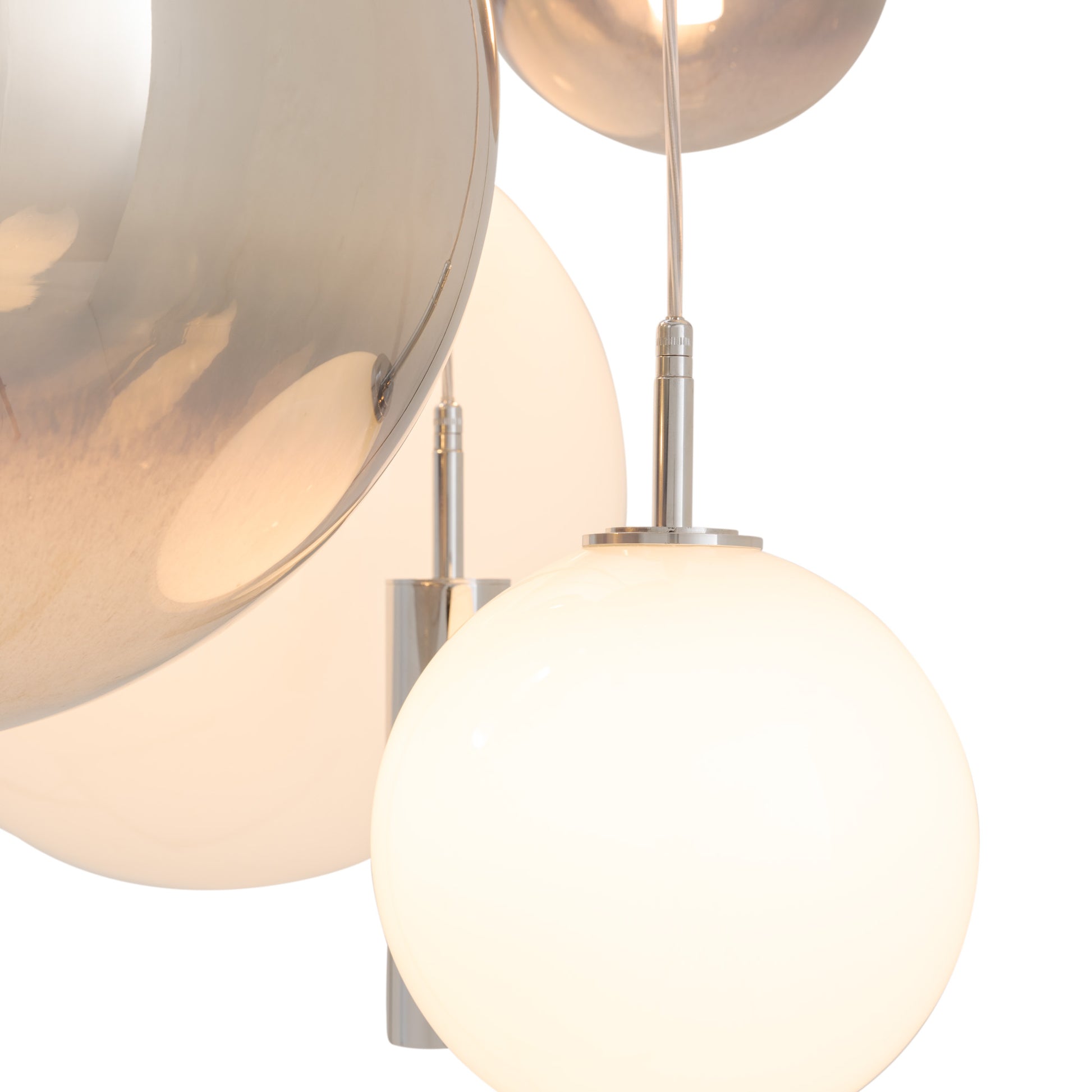 Glass spheres lit from within + engraved central pendant