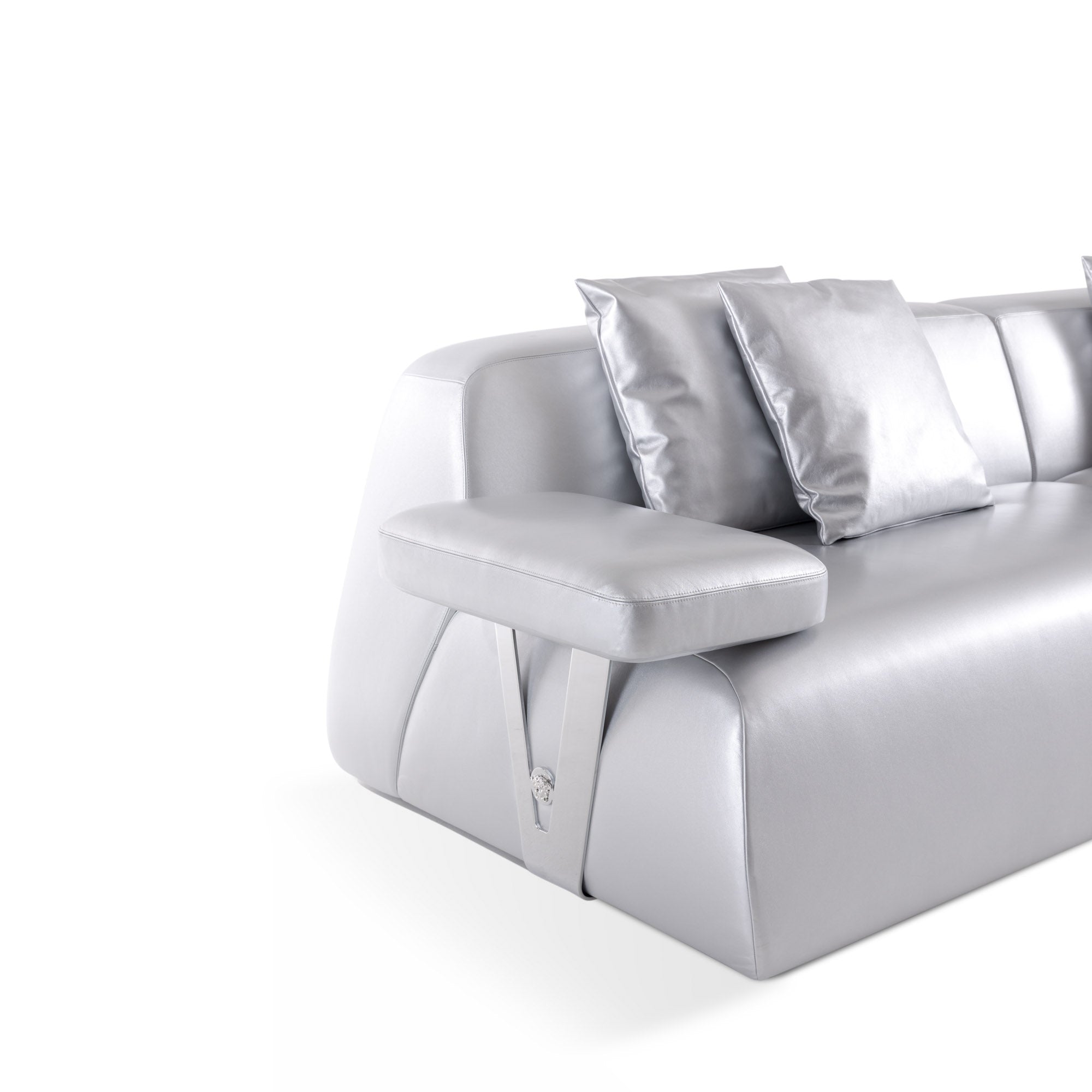 Polished metal armrest with Medusa logo