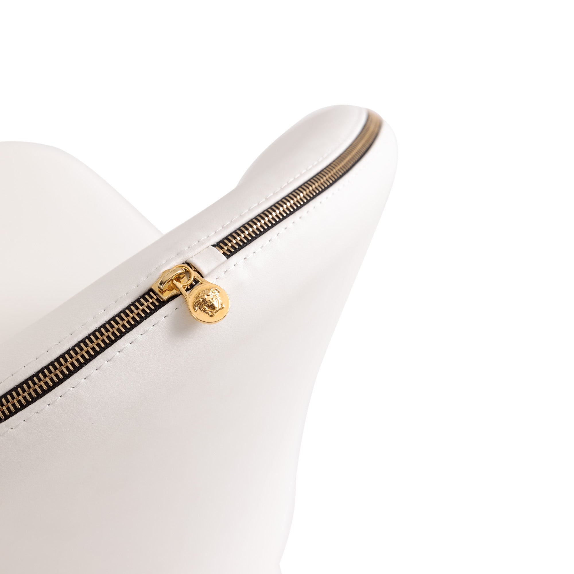 The decorative zipper around the backrest
